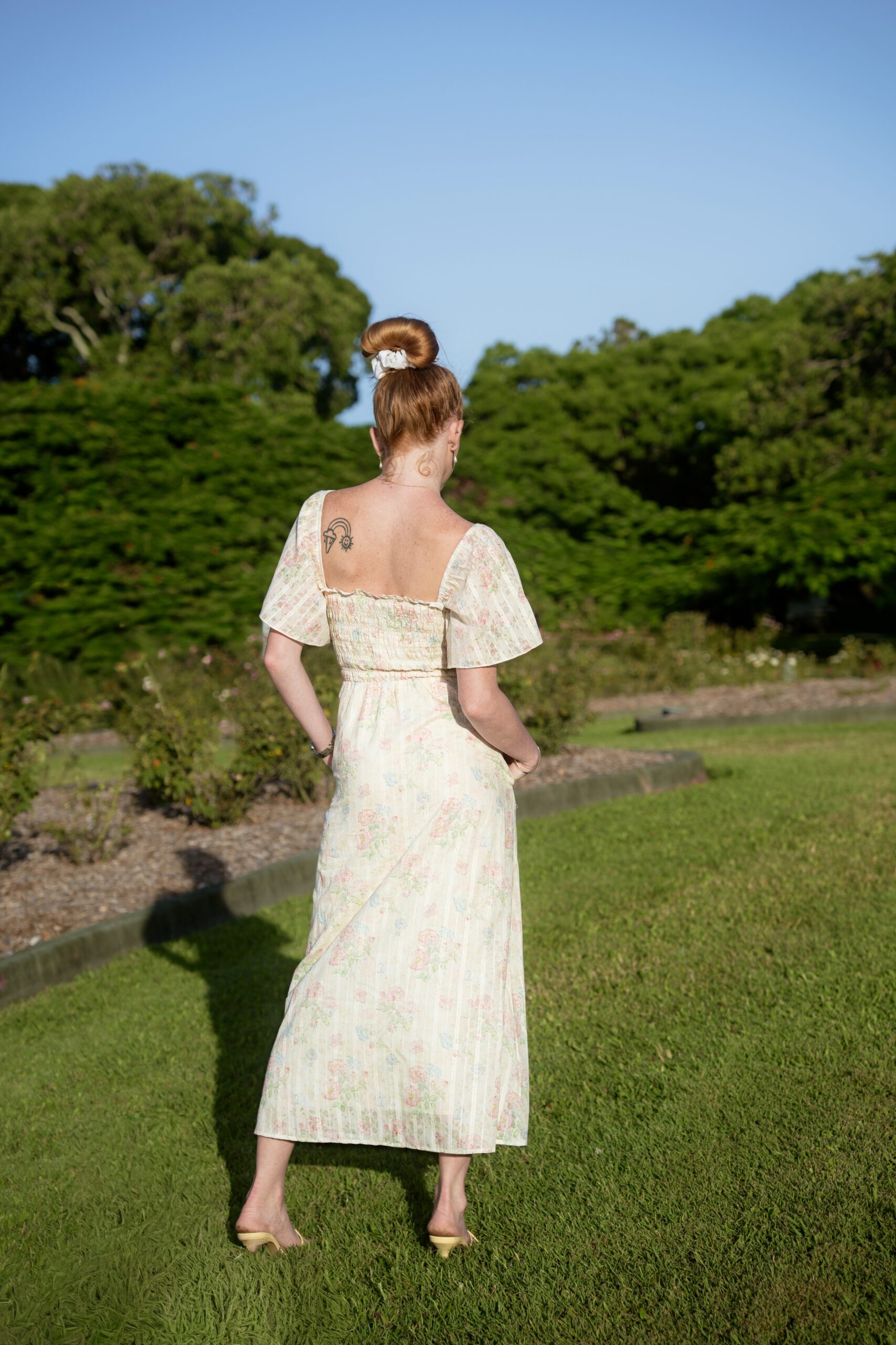 Calla Multiway Smocked Maxi Dress — back view showing smocked back panel and interchangeable strap options | La Mira Singapore