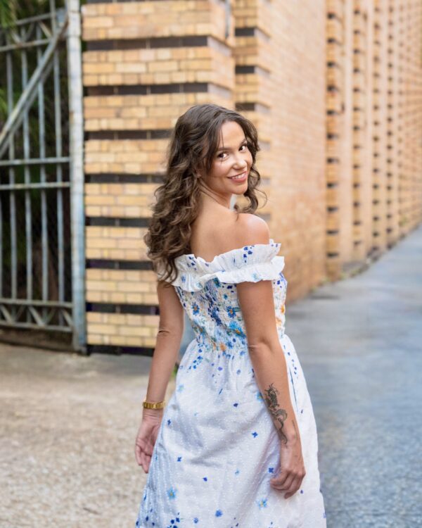 Clarisse Off Shoulder Maxi Dress White Blue — back showing smocked panel and side zip closure | La Mira Singapore