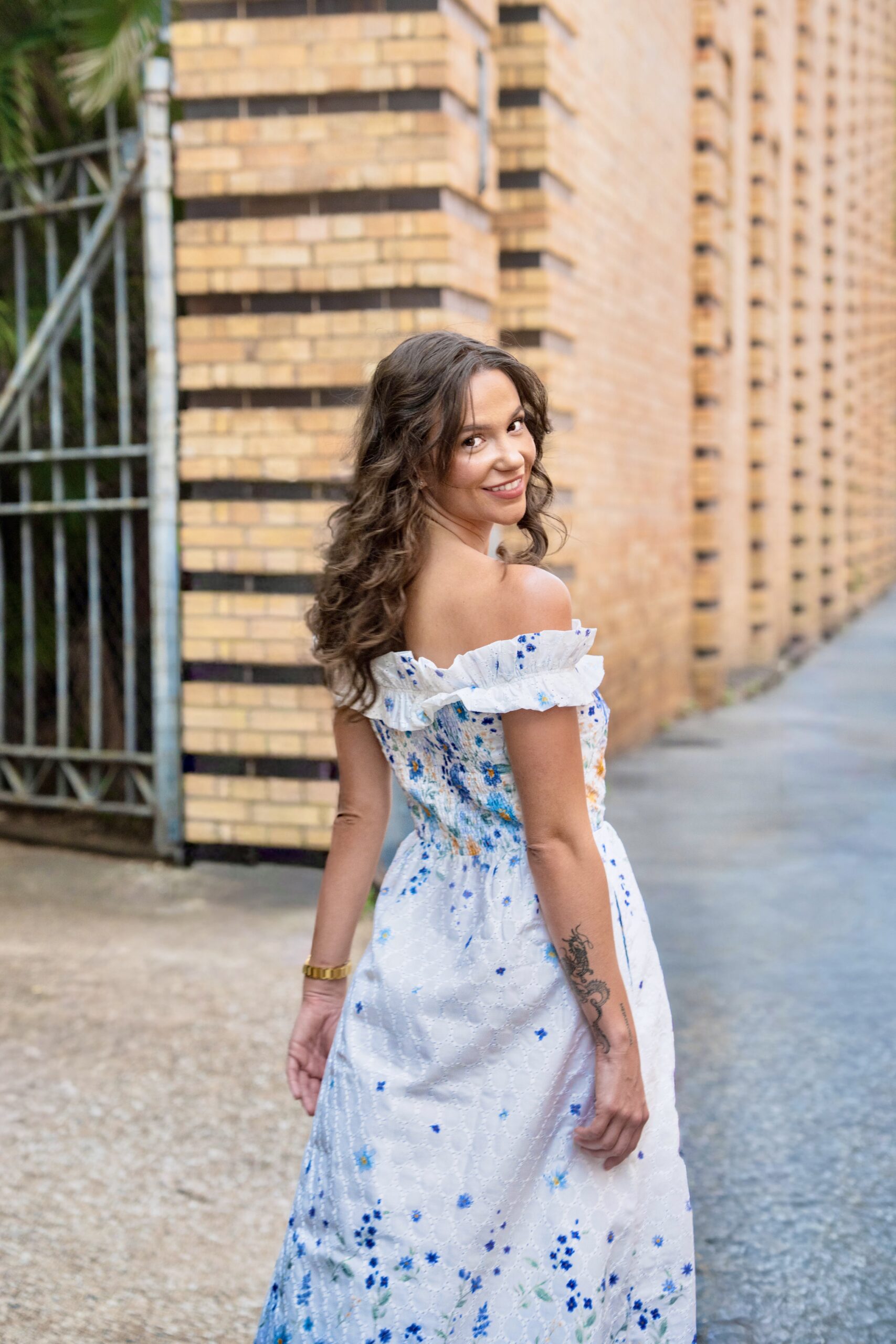 Clarisse Off Shoulder Maxi Dress White Blue — back showing smocked panel and side zip closure | La Mira Singapore
