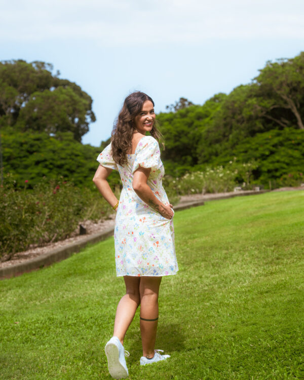 Aria Babydoll Dress — back view with concealed zip closure on white broderie mini dress | La Mira Singapore