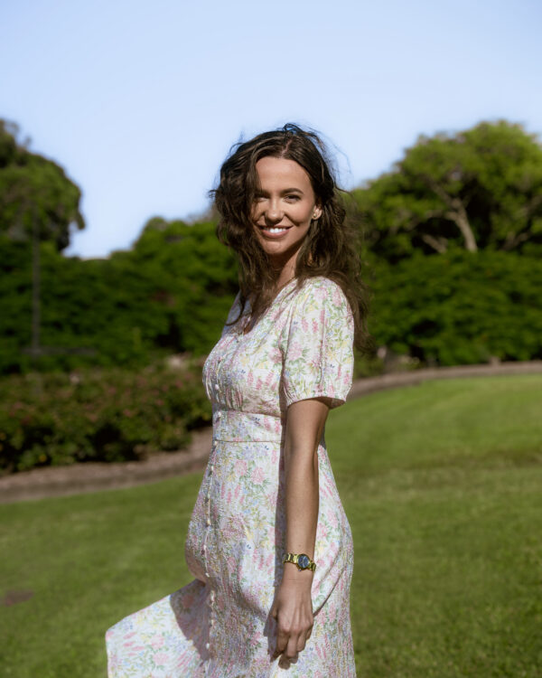 Mila Midi Dress — close-up of pastel floral print, decorative button detail, and puff sleeve on cotton viscose fabric | La Mira Singapore