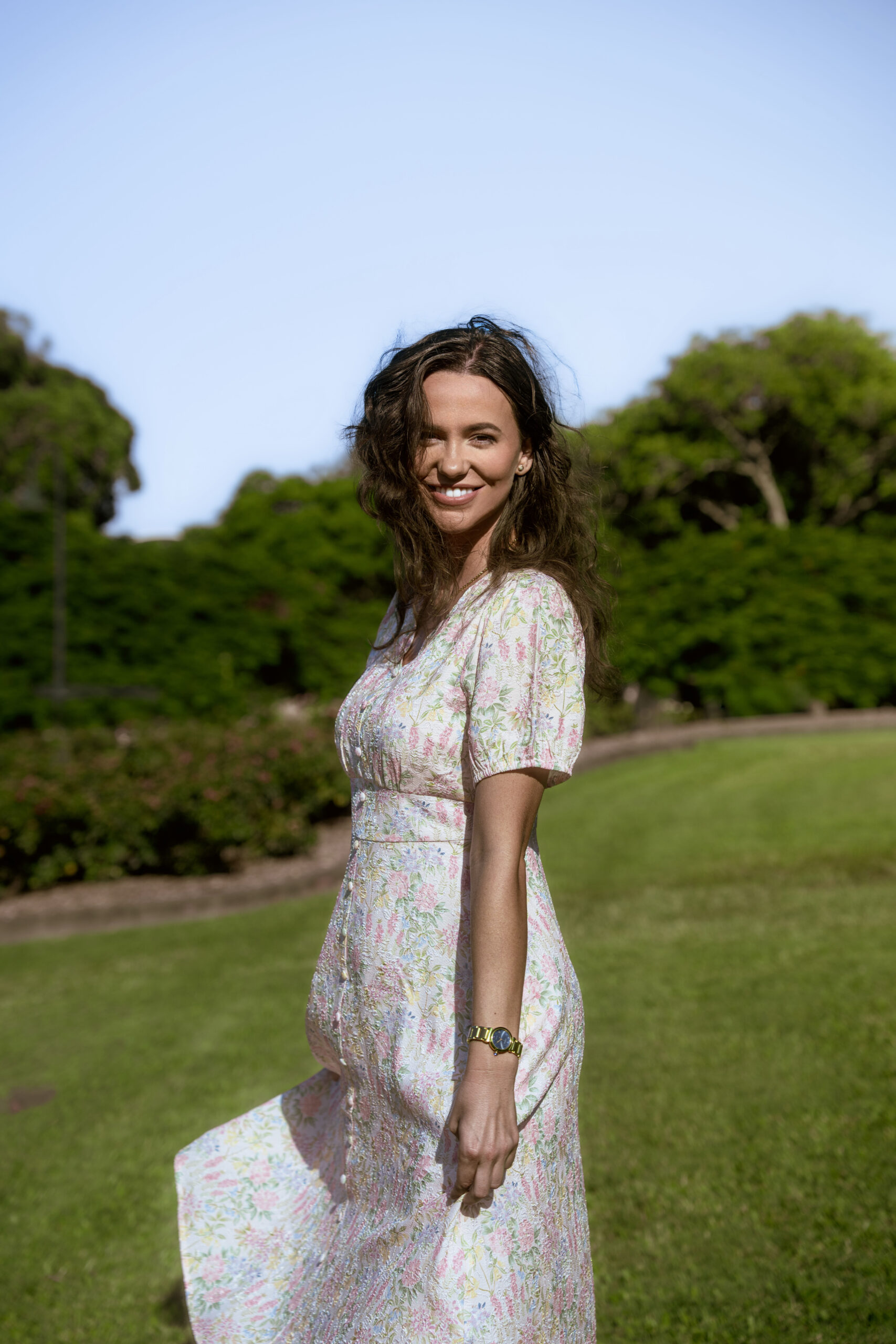 Mila Midi Dress — close-up of pastel floral print, decorative button detail, and puff sleeve on cotton viscose fabric | La Mira Singapore